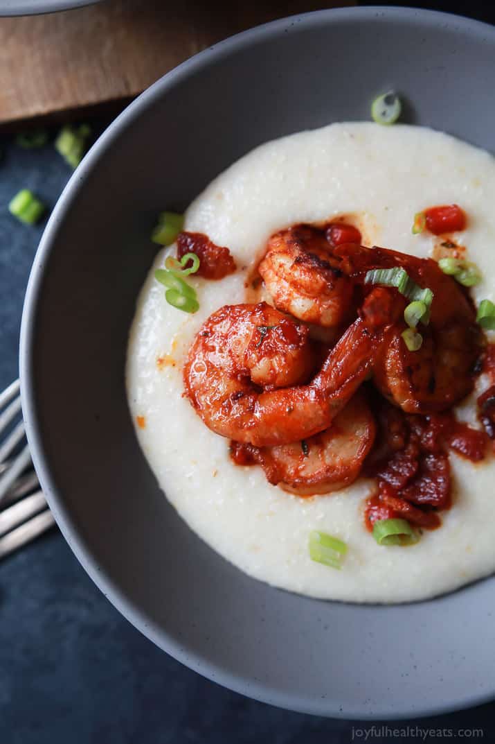 Top view of Spicy Cajun Shrimp over creamy Smoked Gouda Grits