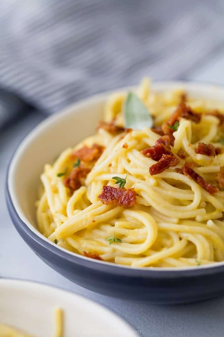 close up of creamy butternut squash pasta in a bowl