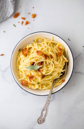 bowl of creamy butternut squash pasta with bacon