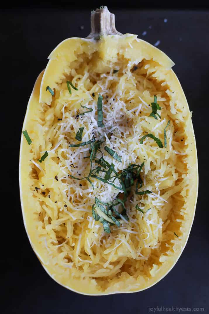 A 15 Minute way to make Spaghetti Squash that you will fall in love with, Parmesan Herb Microwave Spaghetti Squash. It's as easy as 1,2, ... and it needs to be on your table this holiday season! | joyfulhealthyeats.com 