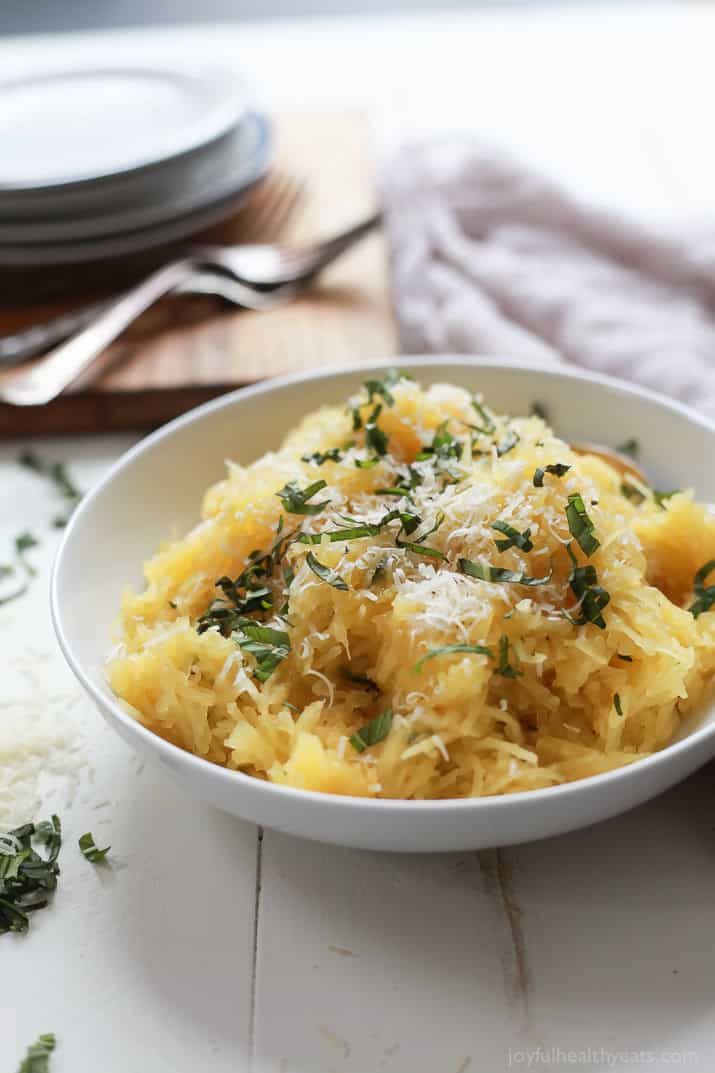 A 15 Minute way to make Spaghetti Squash that you will fall in love with, Parmesan Herb Microwave Spaghetti Squash. It's as easy as 1,2, ... and it needs to be on your table this holiday season! | joyfulhealthyeats.com Easy Dinner Recipes