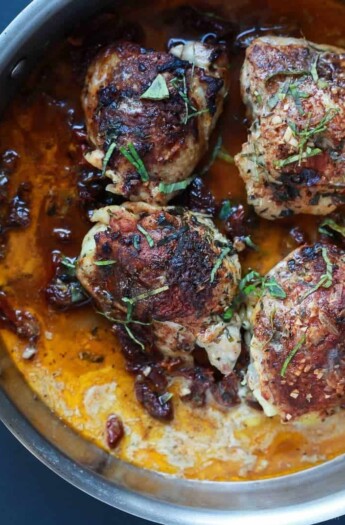 A bowl of Smoky Coconut Milk Braised Chicken Thighs.