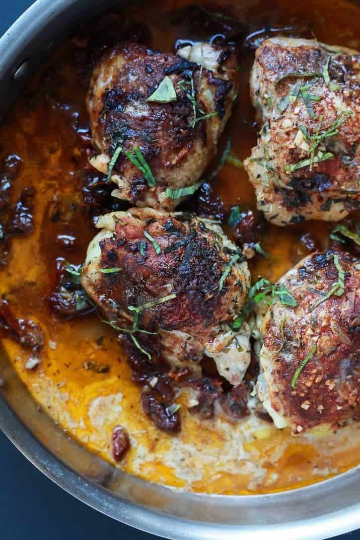 Smoky Coconut Milk Braised Chicken, full of flavor surprises from coconut milk, to smoky paprika, sun-dried tomatoes, and a surprise ingredient that will take you over the top! You will fall in love with the rich flavors of this dish! | joyfulhealthyeats.com