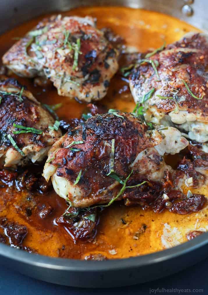 Smoky Coconut Milk Braised Chicken, full of flavor surprises from coconut milk, to smoky paprika, sun-dried tomatoes, and a surprise ingredient that will take you over the top! You will fall in love with the rich flavors of this dish! | joyfulhealthyeats.com 