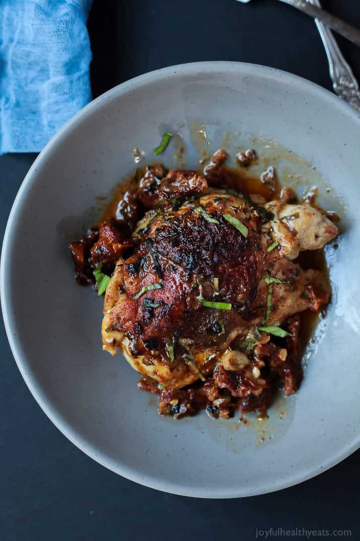 Smoky Coconut Milk Braised Chicken, full of flavor surprises from coconut milk, to smoky paprika, sun-dried tomatoes, and a surprise ingredient that will take you over the top! You will fall in love with the rich flavors of this dish! | joyfulhealthyeats.com 