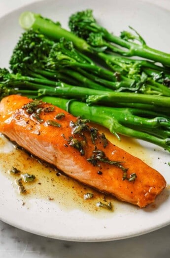 Pan seared salmon recipe with brown butter sauce and broccolini on the side.