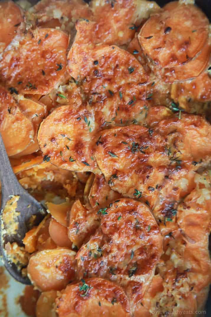 Top view of a pan of Cheesy Scalloped Sweet Potatoes.