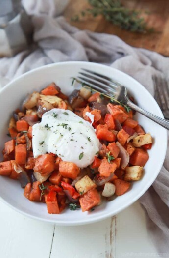 An Easy Sweet Potato Hash topped with Poached Eggs, you'll love the secret spice in this hash! It's the perfect breakfast or dinner for your family and easily fits into Paleo Diet. | joyfulhealthyeats.com #recipes #ad #vegetarian