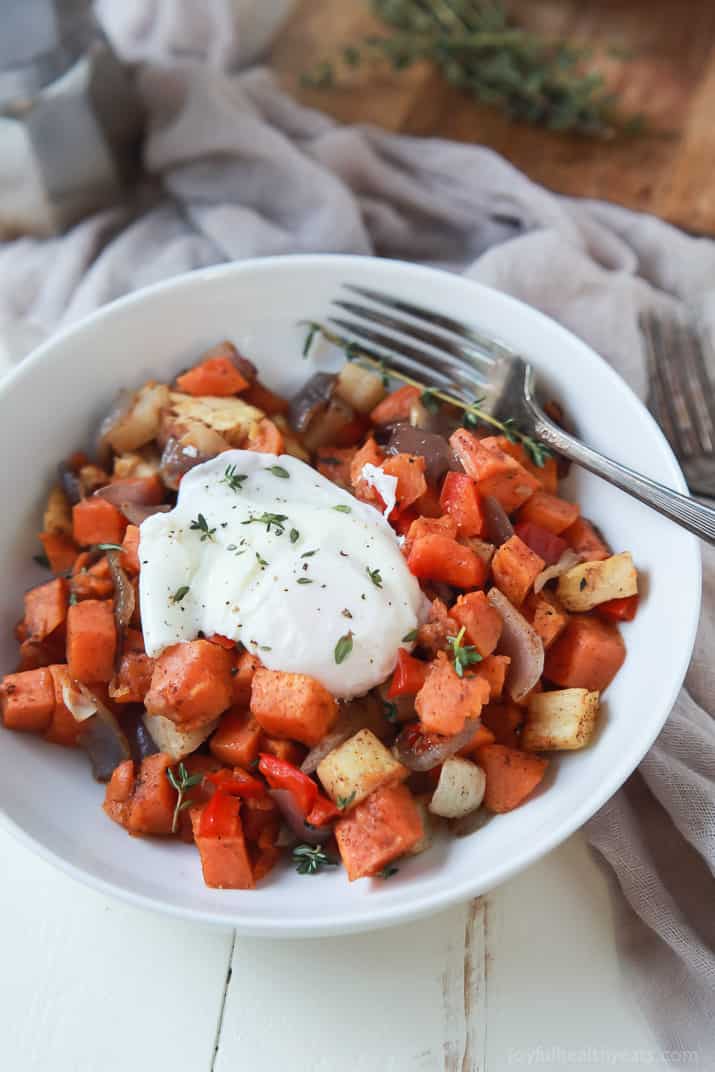 A bowl of Sweet Potato Hash topped with a Poached Egg