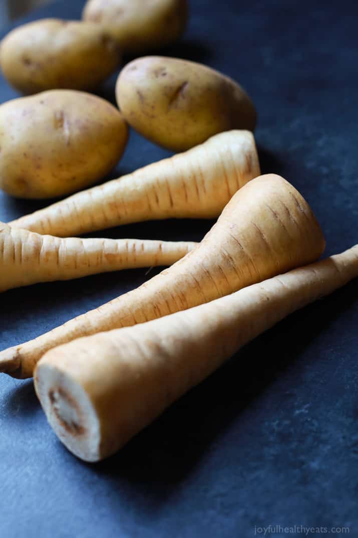 Creamy Buttery Parsnip Garlic Mashed Potatoes, the parsnips in this totally make these the BEST Mashed Potatoes you will ever have! Plus they are only 108 calories a serving! | joyfulhealthyeats.com