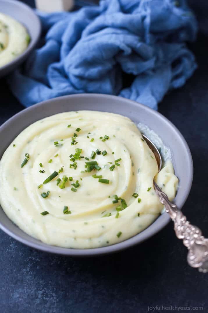 Creamy Buttery Parsnip Garlic Mashed Potatoes, the parsnips in this totally make these the BEST Mashed Potatoes you will ever have! Plus they are only 108 calories a serving! | joyfulhealthyeats.com