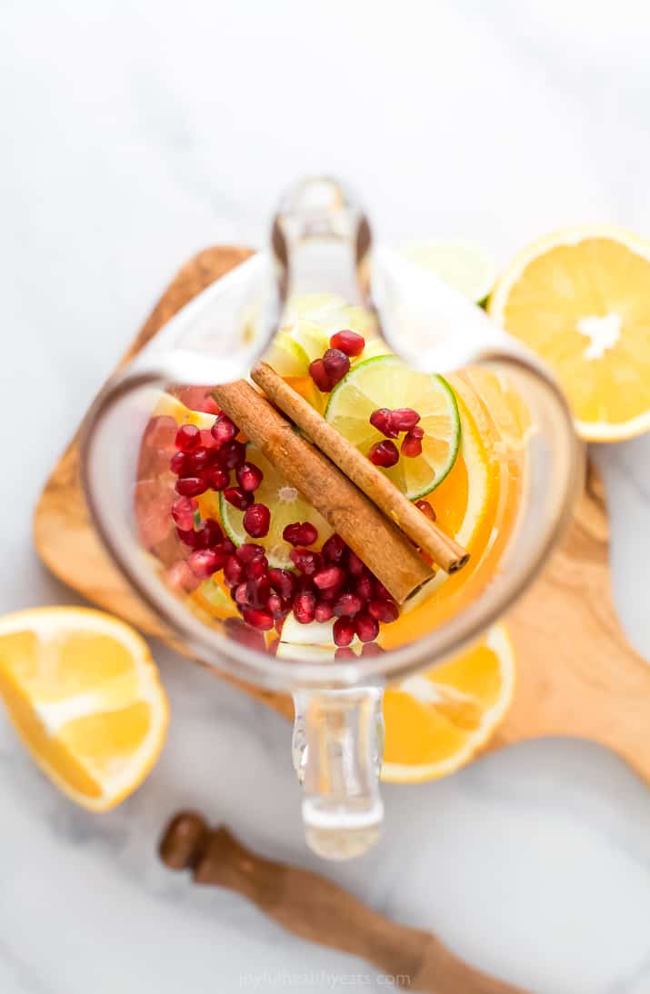 overhead photo of the fruit in a pitcher for a holiday sangria recipe