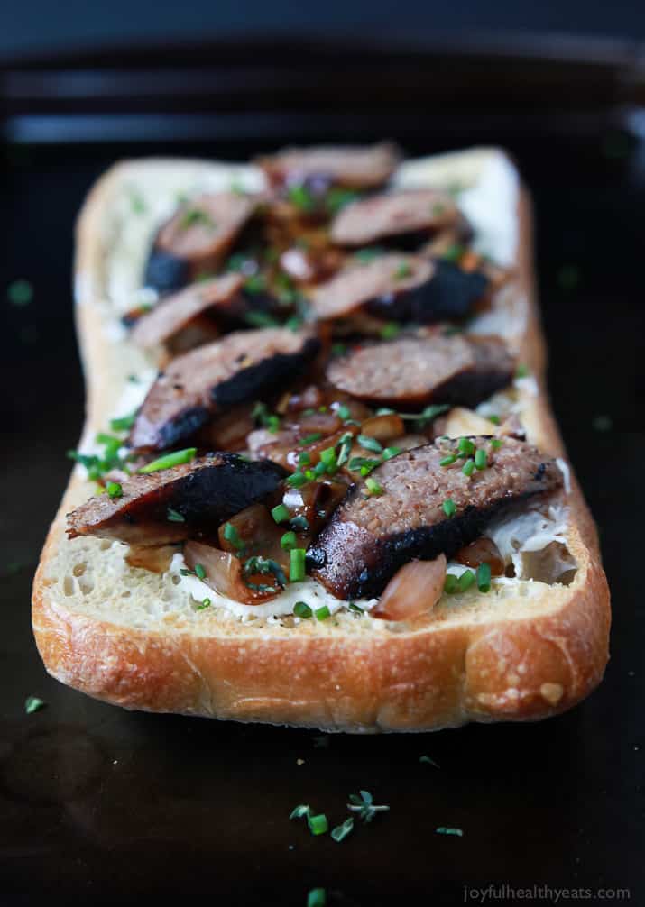 Balsamic Italian Sausage Crostini topped with Whipped Goat Cheese