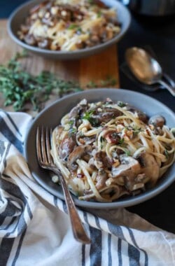 Drunken Wild Mushroom Pasta with a Creamy Goat Cheese Sauce - this recipe is total comfort food! Easy, done in just 30 minutes, only 331 calories, and vegetarian | joyfulhealthyeats.com