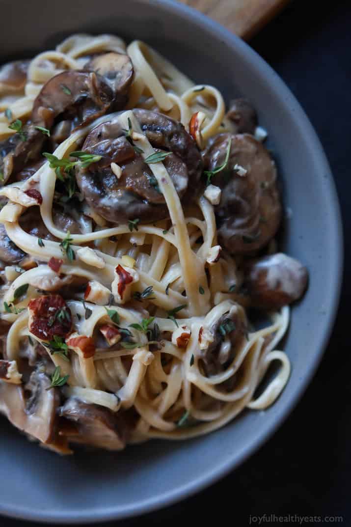 Top view of Drunken Wild Mushroom Pasta with a Creamy Goat Cheese Sauce in a bowl