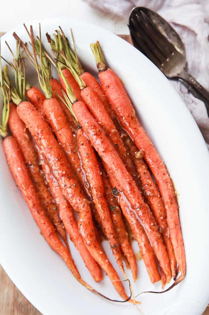 3 Ingredient Honey Mustard Glazed Carrots piled in a white bowl