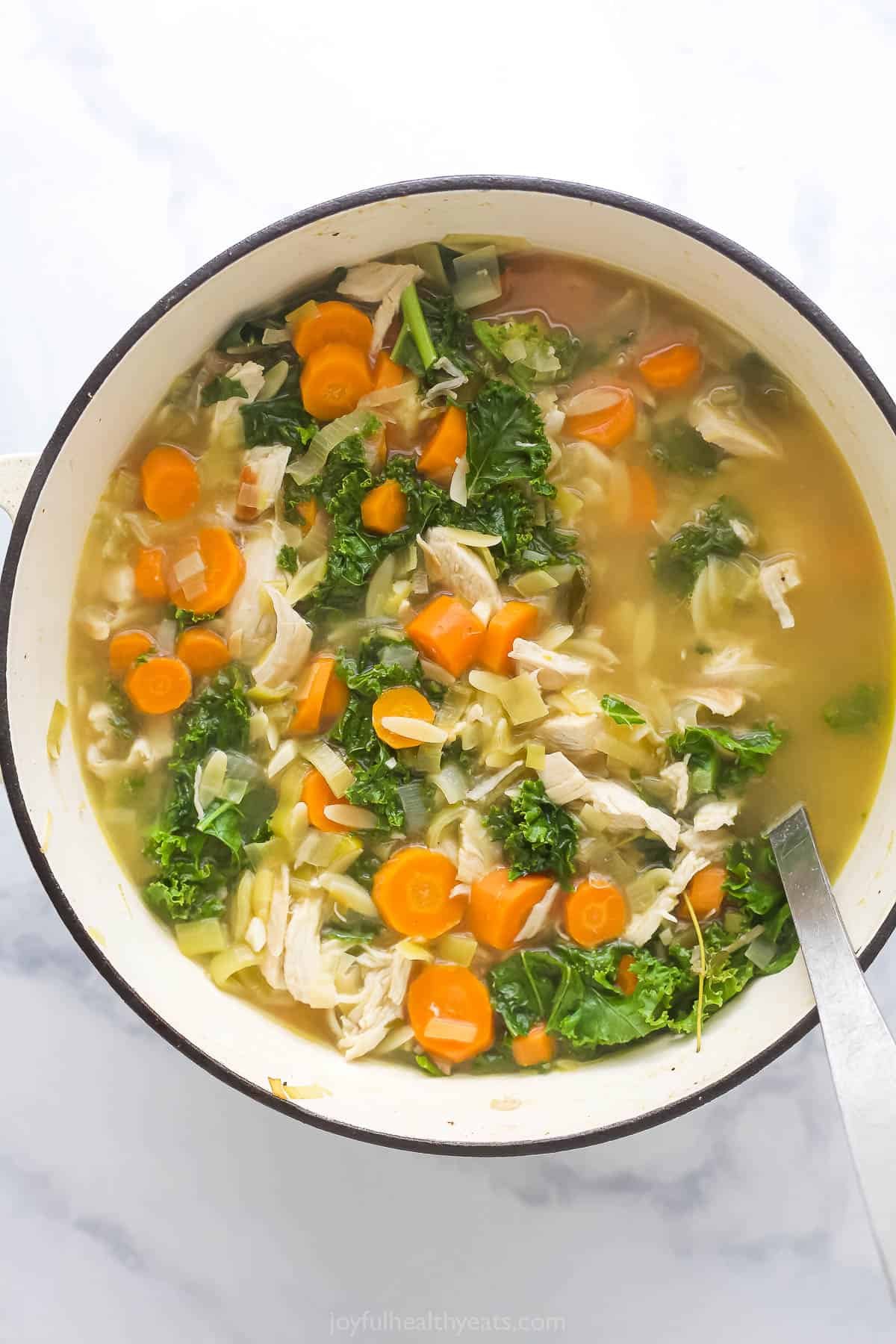 Pouring in the broth. 