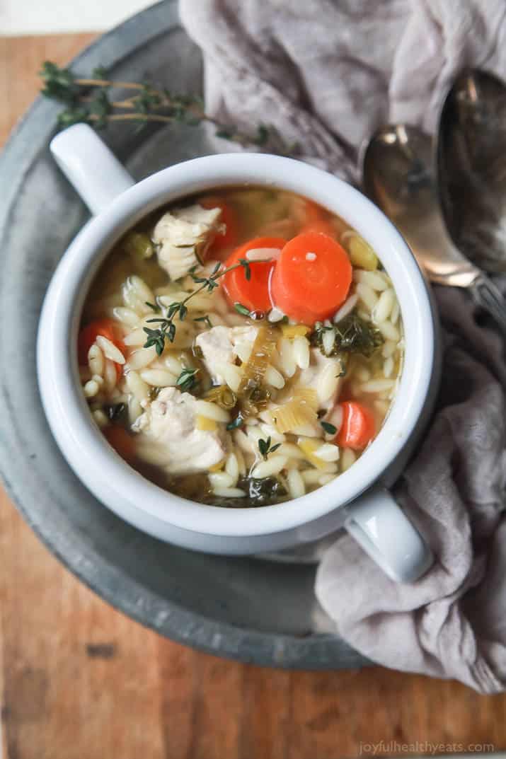 Light Lemon Chicken Orzo Soup - the perfect comfort soup that's full of vegetables, protein, and a fresh lemony broth that you'll swoon over! This soup is pure bliss on cold winter day! | joyfulhealthyeats.com