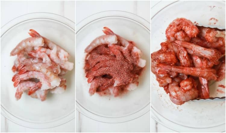 Shrimp being coated with spicy seasonings in a mixing bowl