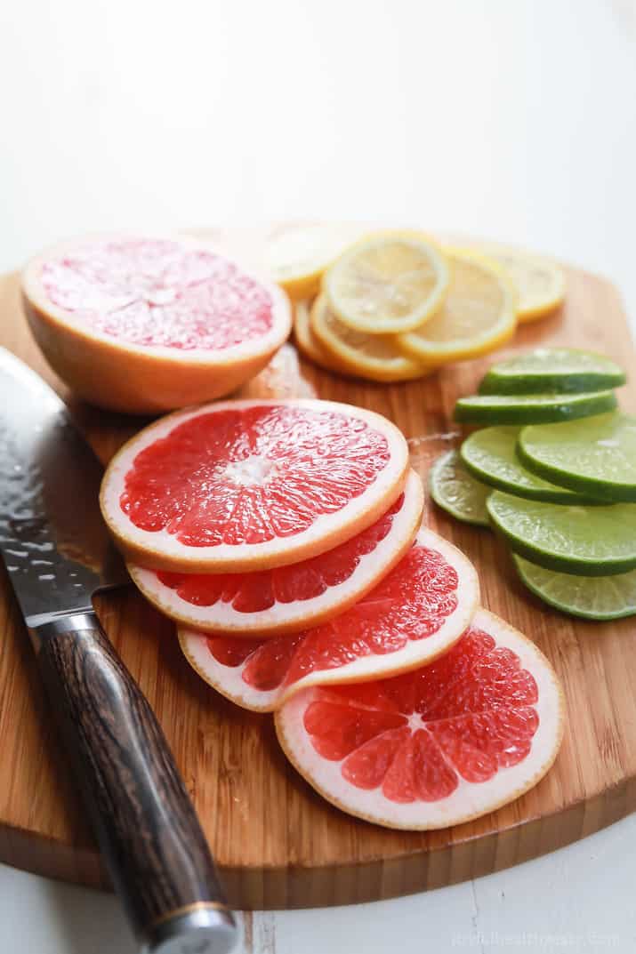 Sliced citrus fruit on a cutting board