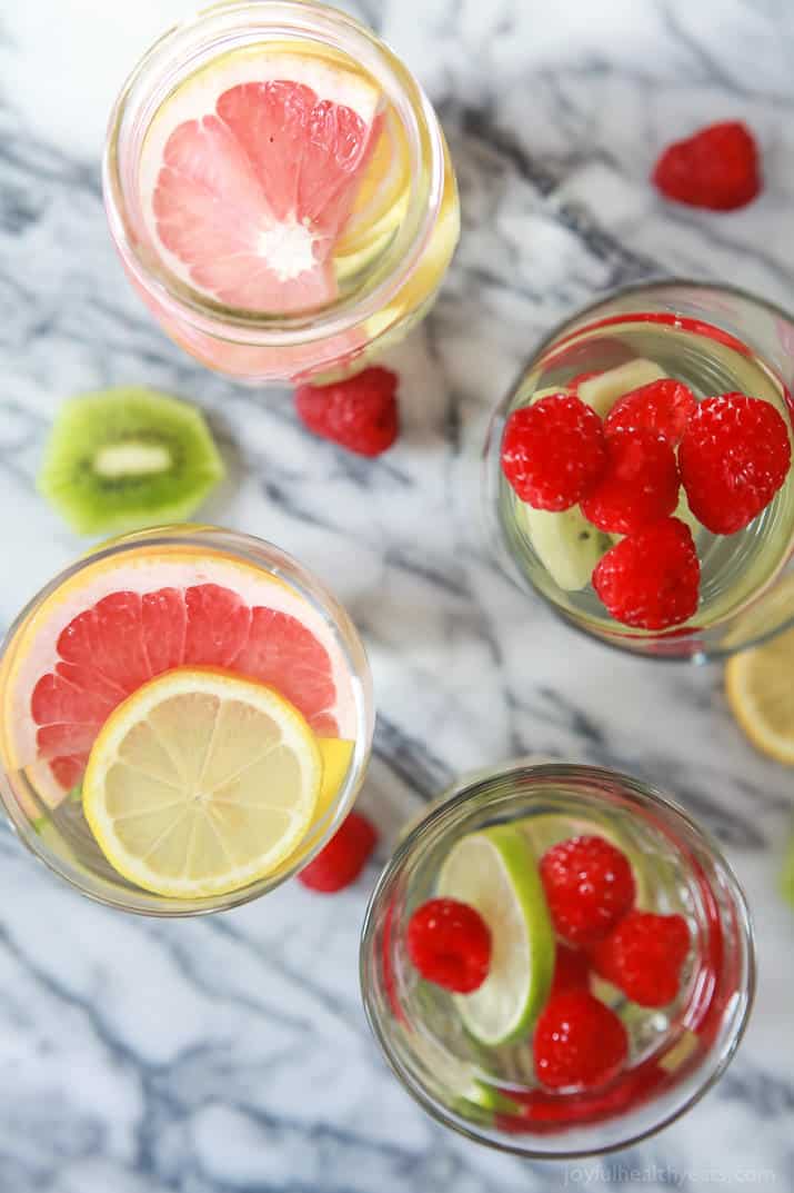 Top view of four glasses of Fruit Infused Water 