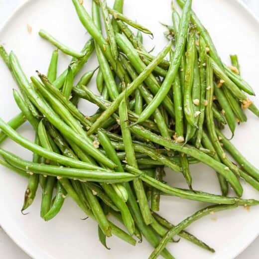 Plate of skillet green beans with garlic.