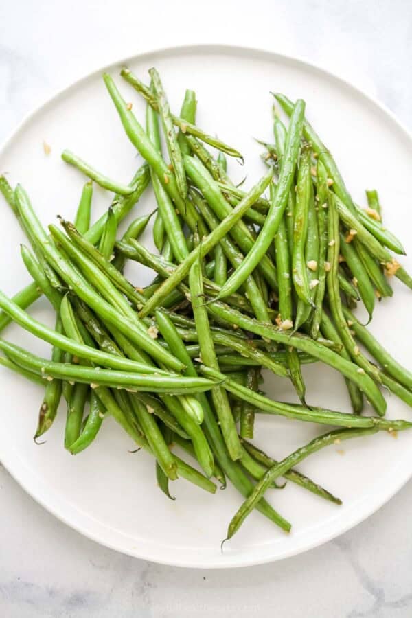 Plate of skillet green beans with garlic.