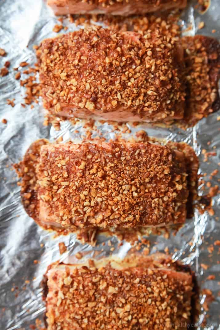 Impress your family or dinner guests with this easy Honey Mustard Pecan Crusted Salmon recipe. All you'll need is 5 ingredients and 15 minutes to make this dynamite meal! Dinner just got easier! | joyfulhealthyeats.com #paleo #glutenfree