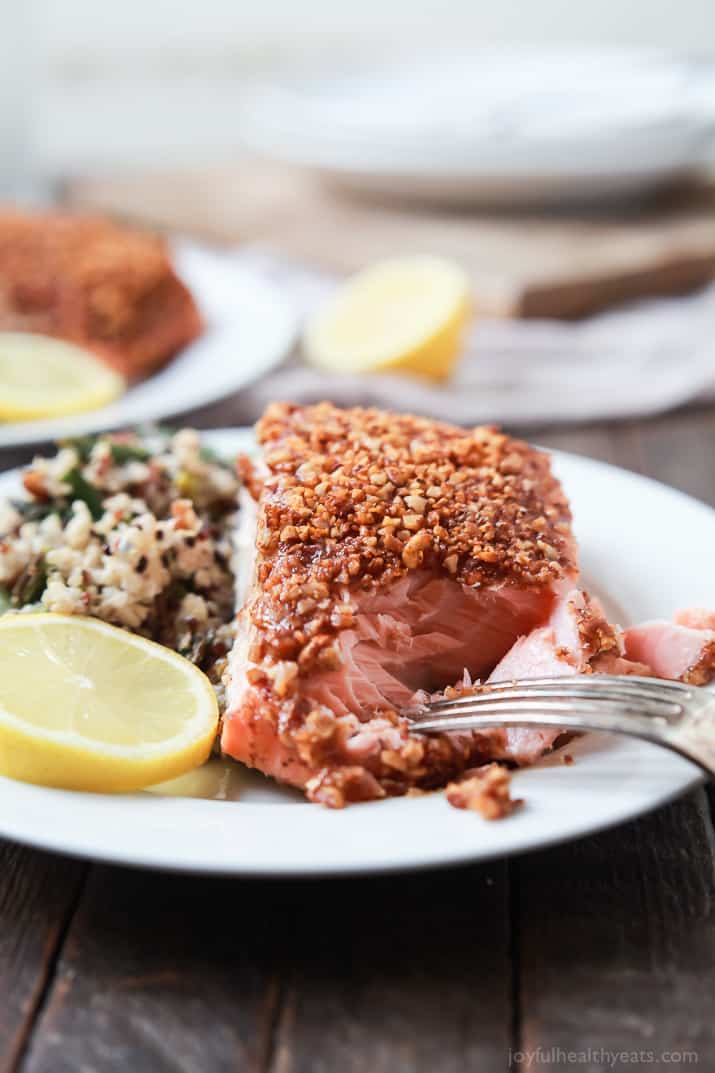 Impress your family or dinner guests with this easy Honey Mustard Pecan Crusted Salmon recipe. All you'll need is 5 ingredients and 15 minutes to make this dynamite meal! Dinner just got easier! | joyfulhealthyeats.com #paleo #glutenfree