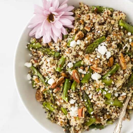 light creamy goat cheese asparagus quinoa salad in a bowl