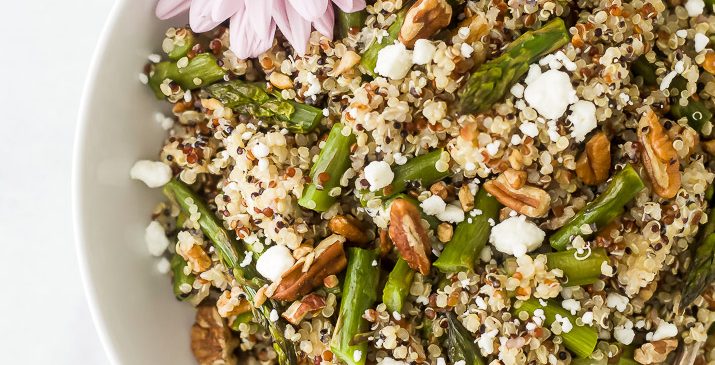 light creamy goat cheese asparagus quinoa salad in a bowl