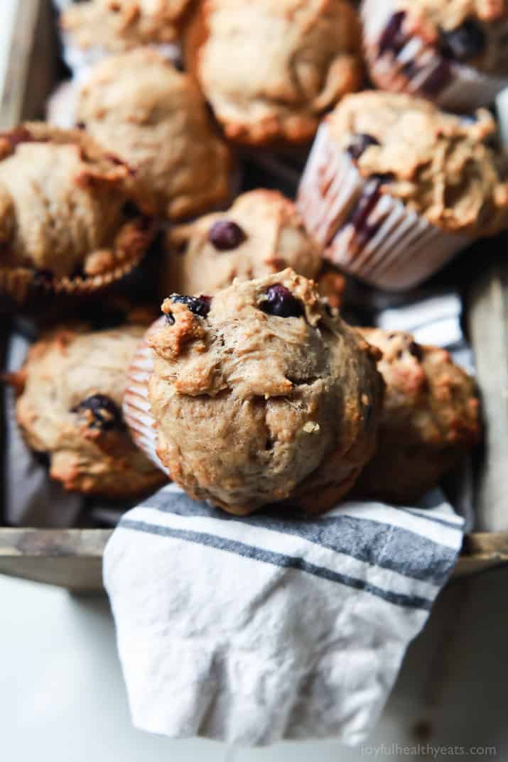 These extremely Moist Lemon Blueberry Muffins are so easy to make, filled with fresh lemon and blueberry flavor, and made with no butter or refined sugar! The BEST muffin ever! | joyfulhealthyeats.com