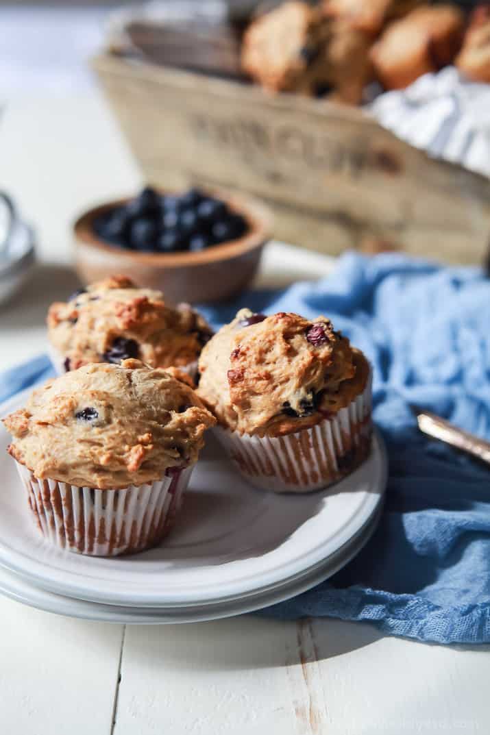 These extremely Moist Lemon Blueberry Muffins are so easy to make, filled with fresh lemon and blueberry flavor, and made with no butter or refined sugar! The BEST muffin ever! | joyfulhealthyeats.com