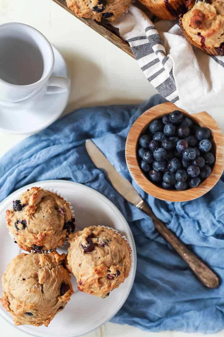 These extremely Moist Lemon Blueberry Muffins are so easy to make, filled with fresh lemon and blueberry flavor, and made with no butter or refined sugar! The BEST muffin ever! | joyfulhealthyeats.com