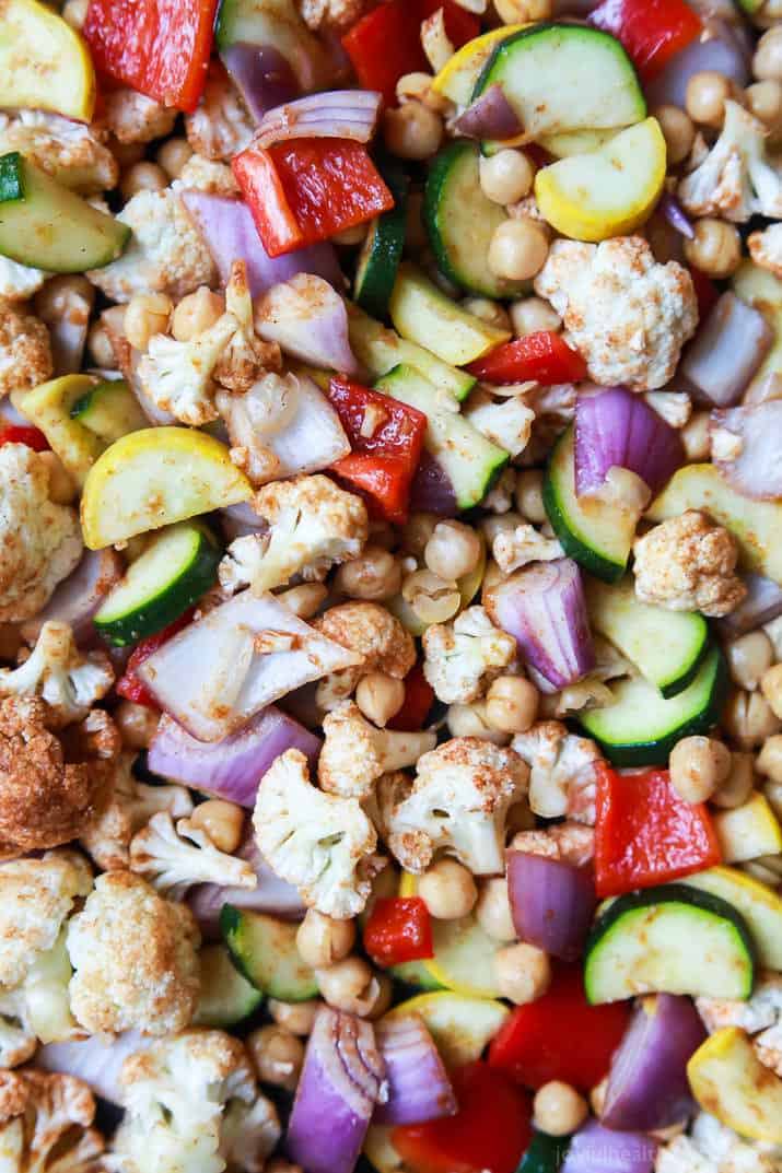 Moroccan Cauliflower Chickpea Pita - done in 35 minutes, filled with spiced roasted vegetables & covered in Tzatziki Sauce. A meal your family will love and perfect for meatless Monday! | joyfulhealthyeats.com #vegetarian