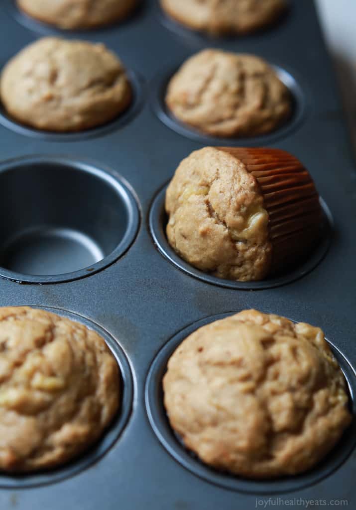 Spiced Chai Banana Muffins with a secret ingredient for an extra nutritional boost. These muffins are butter free, refined sugar free, crazy moist, and absolutely delicious. You and your kids will fall in love! | joyfulhealthyeats.com