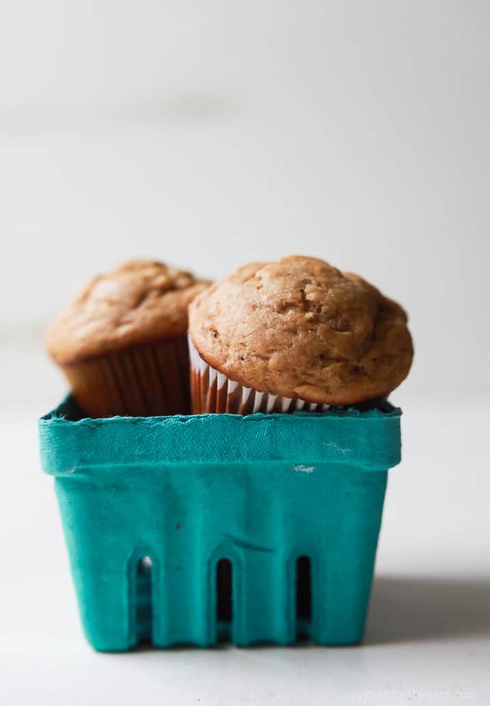 Spiced Chai Banana Muffins with a secret ingredient for an extra nutritional boost. These muffins are butter free, refined sugar free, crazy moist, and absolutely delicious. You and your kids will fall in love! | joyfulhealthyeats.com