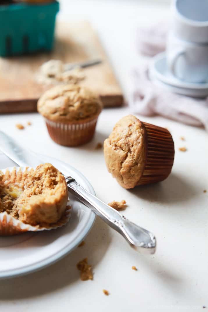 Spiced Chai Banana Muffins with a secret ingredient for an extra nutritional boost. These muffins are butter free, refined sugar free, crazy moist, and absolutely delicious. You and your kids will fall in love! | joyfulhealthyeats.com