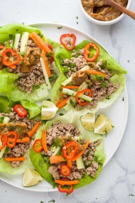 Thai Chicken Lettuce Wraps with Spicy Peanut Sauce on a plate