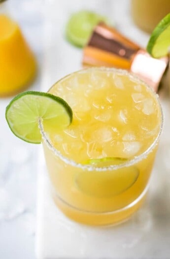 close up photo of a glass filled with a classic margarita