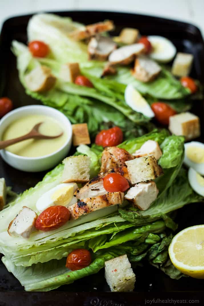 Grilled Chicken Caesar Salad on whole romaine leaves