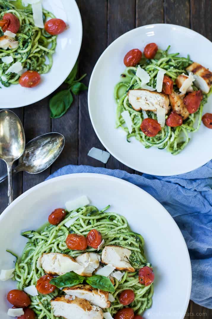 An easy dinner recipe for a busy week, and no stove needed! Pesto Chicken Zoodles with Burst Tomatoes, full of bold flavors, high in protein, and in low carbs! Your family will love it! | joyfulhealthyeats.com