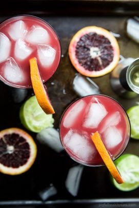 A simple Blood Orange Margarita that's friendly on the waist using no simple syrup. This Margarita Recipe is the perfect party drink - it's fresh, citrus-y, packs a flavor punch and makes enough for a crowd! | joyfulhealthyeats.com