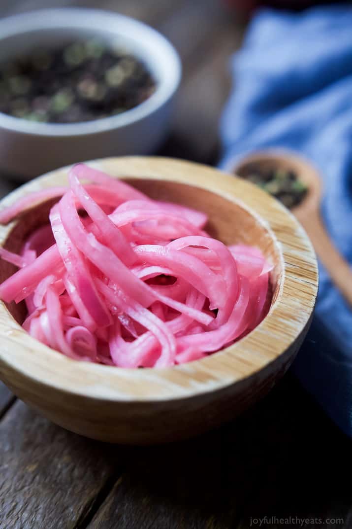 Pickled Onions in a wooden bowl