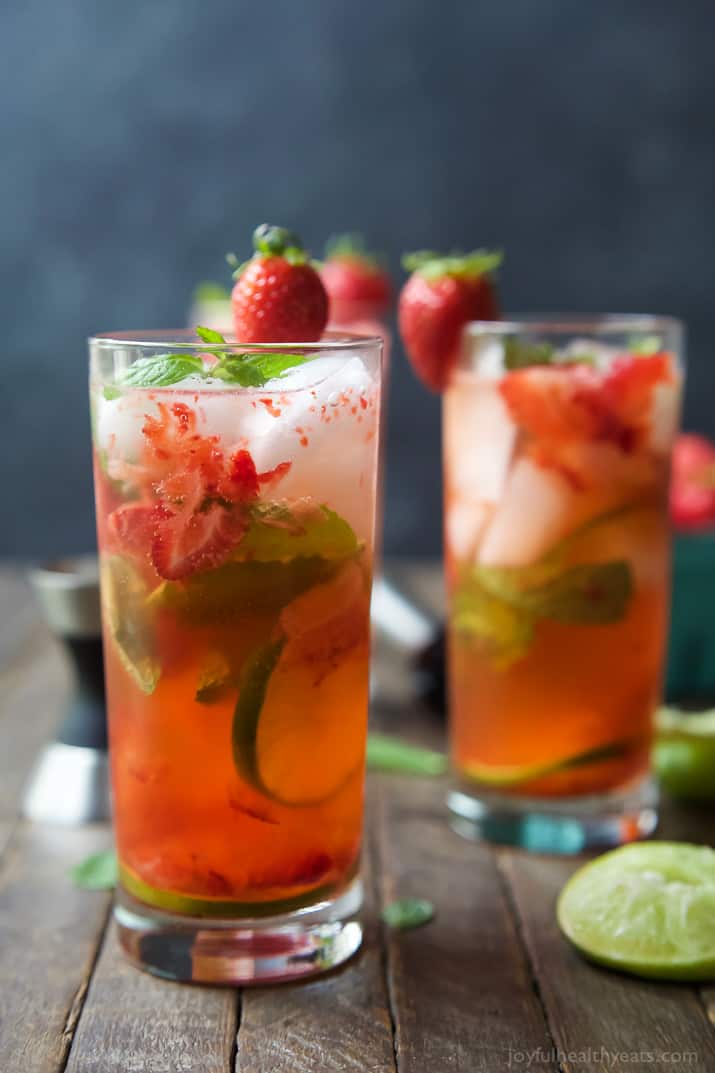 Two tall glasses of Strawberry Mojito