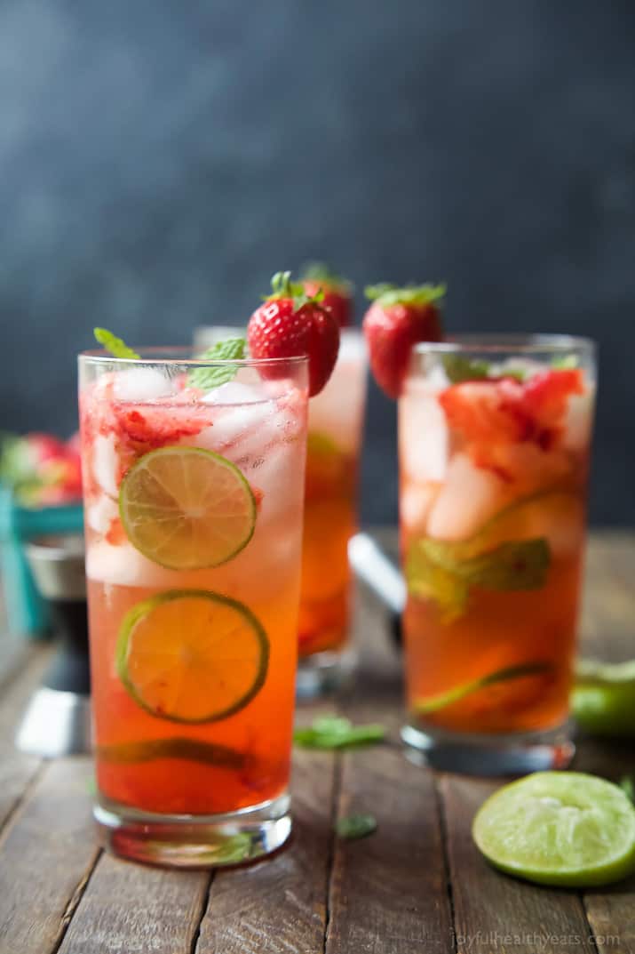 Three tall glasses of Strawberry Mojito