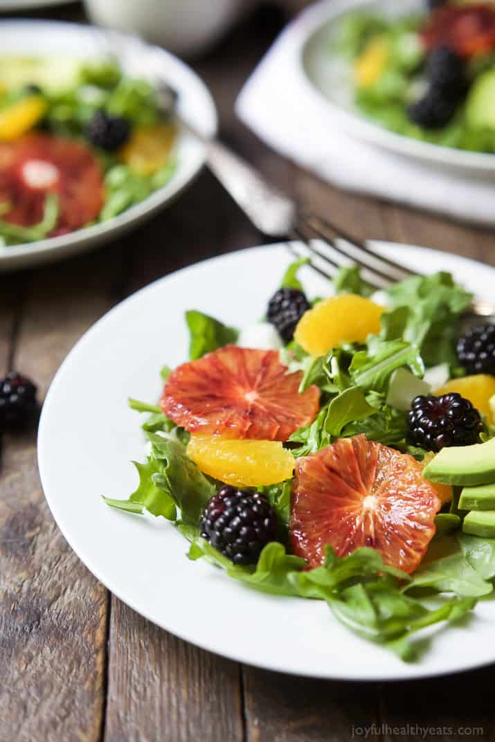 Summer Citrus Avocado Salad filled with fresh blackberries, avocado, spicy arugula, and vibrant citrus then finished with a Citrus Vinaigrette. This Salad is light, refreshing, low calorie, and takes minutes to make! | joyfulhealthyeats.com #glutenfree #vegetarian #paleo