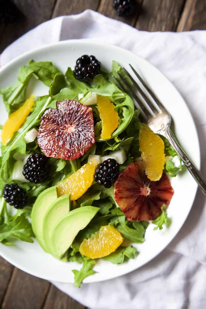 Summer Citrus Avocado Salad filled with fresh blackberries, avocado, spicy arugula, and vibrant citrus then finished with a Citrus Vinaigrette. This Salad is light, refreshing, low calorie, and takes minutes to make! | joyfulhealthyeats.com #glutenfree #vegetarian #paleo