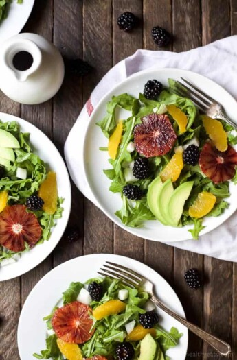 Summer Citrus Avocado Salad filled with fresh blackberries, avocado, spicy arugula, and vibrant citrus then finished with a Citrus Vinaigrette. This Salad is light, refreshing, low calorie, and takes minutes to make! | joyfulhealthyeats.com #glutenfree #vegetarian #paleo