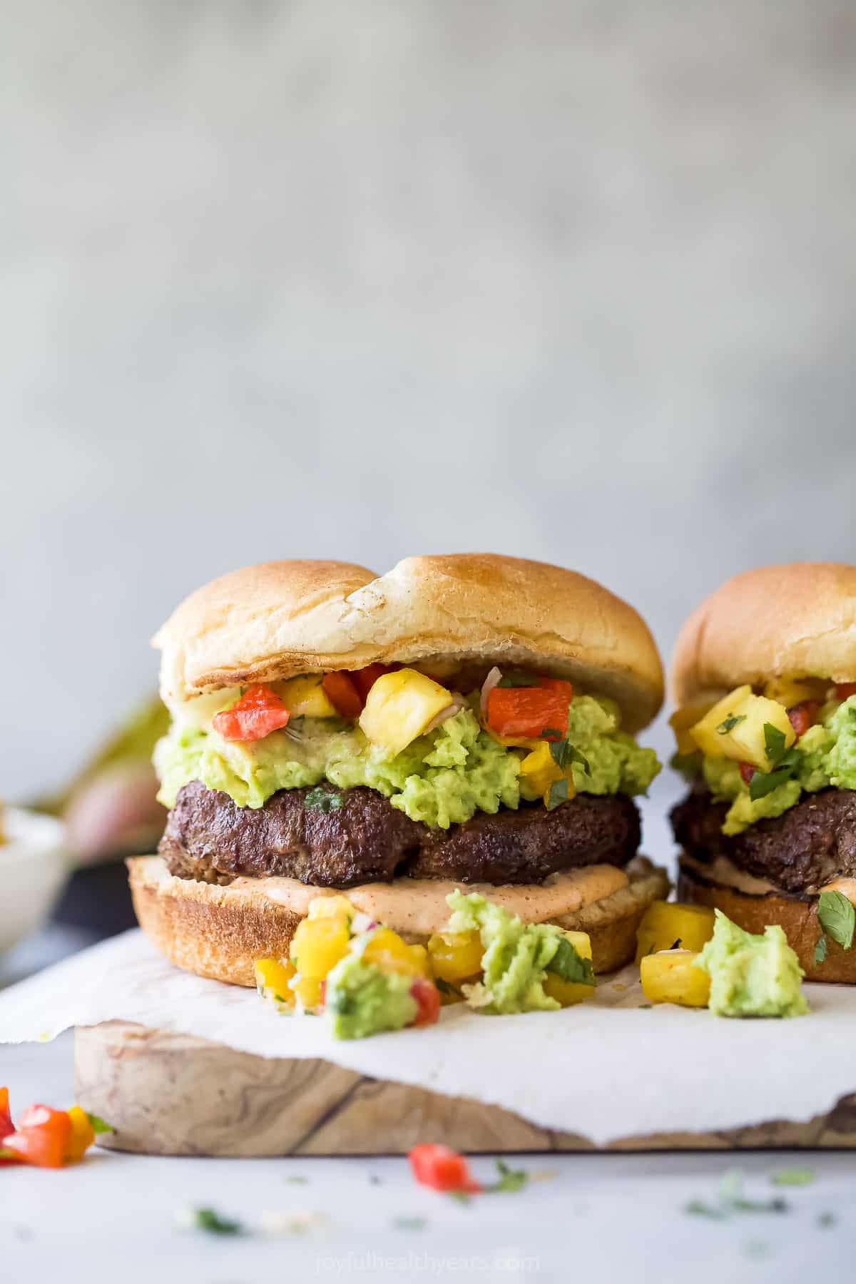 A single avocado hamburger.